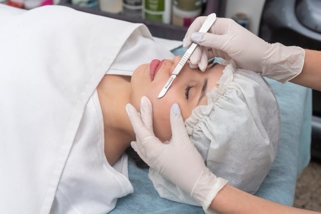 Skin,Treatment,With,The,Dermaplaning,Technique,Performed,With,A,Scalpel